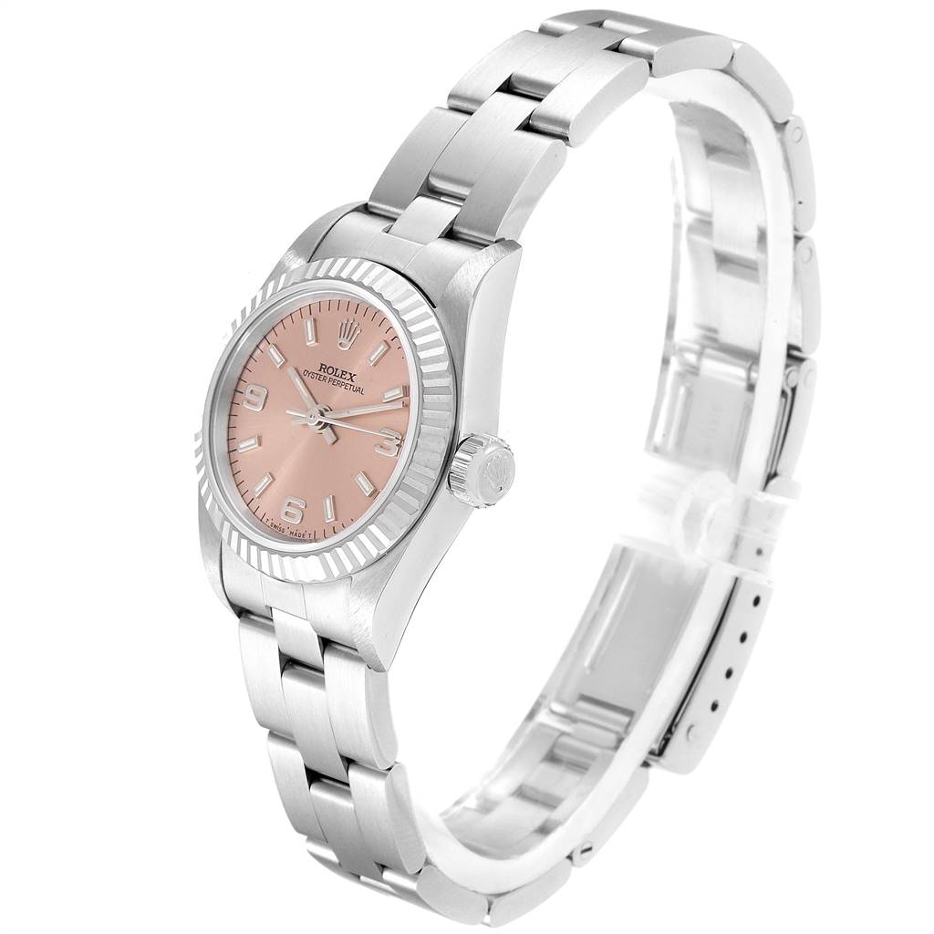 The image shows a Rolex Oyster Perpetual 67194 Women's Stainless Steel Pink Dial 67194 Women's Stainless Steel Pink Dial watch at a three-quarter angle, highlighting the dial, bezel, and bracelet.