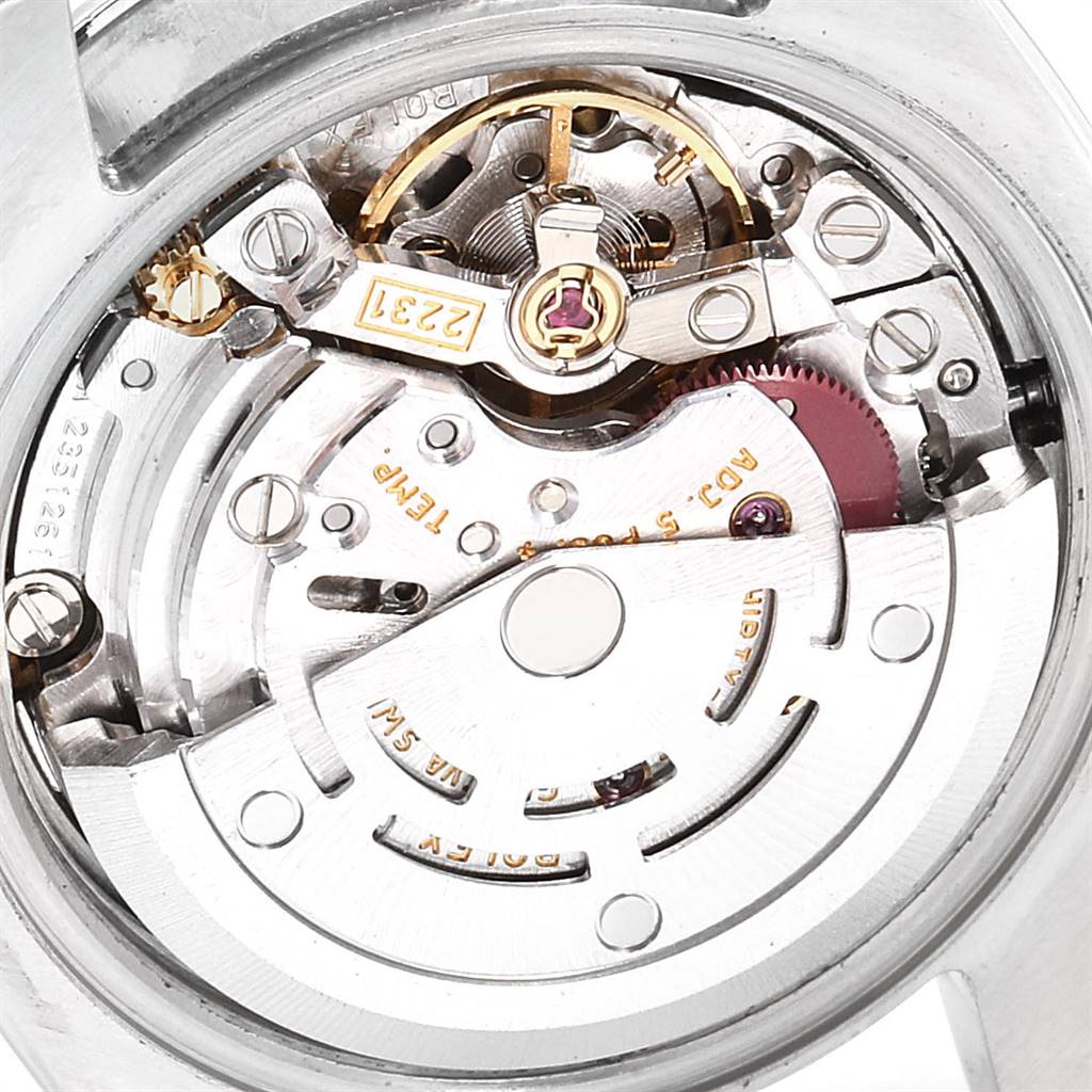 This image shows the movement and inner mechanism of a Rolex Oyster Perpetual 176200 Women's Stainless Steel Black Dial 176200 Women's Stainless Steel Black Dial watch from a close-up rear angle.