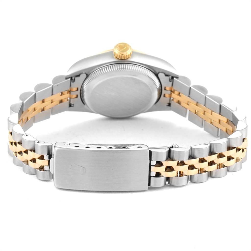 The image shows the back and bracelet of a Rolex Oyster Perpetual 67193 Women
s Steel and Gold (two tone) Champagne Dial 67193 Women
s Steel and Gold (two tone) Champagne Dial watch at a rear angle.