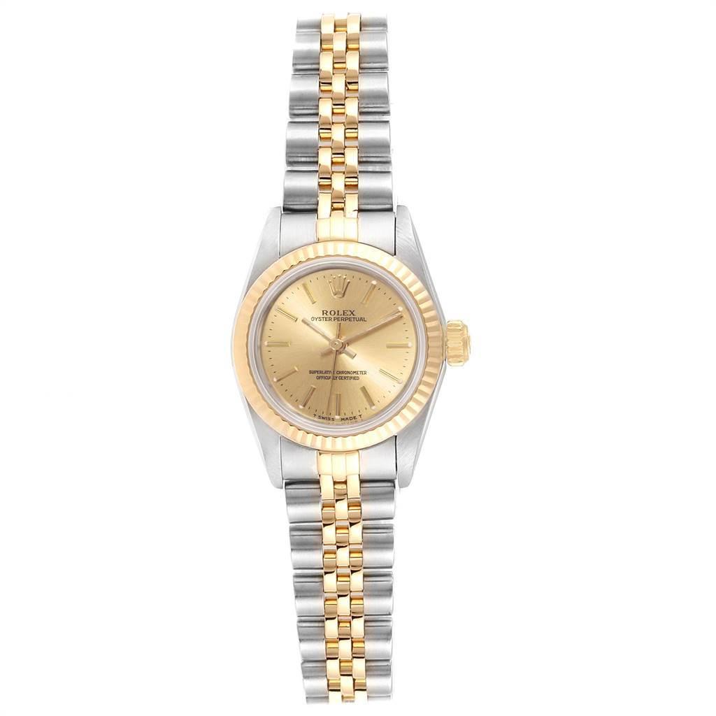 The image shows a front view of a Rolex Oyster Perpetual 67193 Women
s Steel and Gold (two tone) Champagne Dial 67193 Women
s Steel and Gold (two tone) Champagne Dial watch with a bicolor bracelet, and a gold bezel and dial.