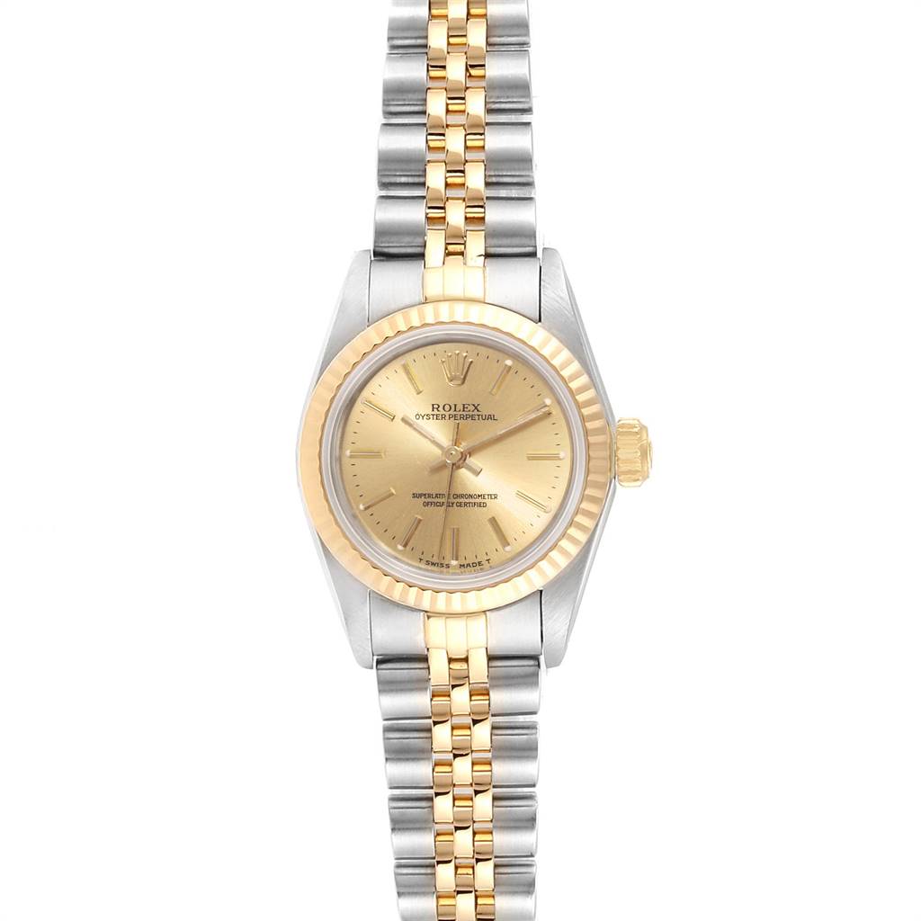 This is a front view of a Rolex Oyster Perpetual 67193 Women
s Steel and Gold (two tone) Champagne Dial 67193 Women
s Steel and Gold (two tone) Champagne Dial watch, showcasing its dial, bezel, and bracelet.