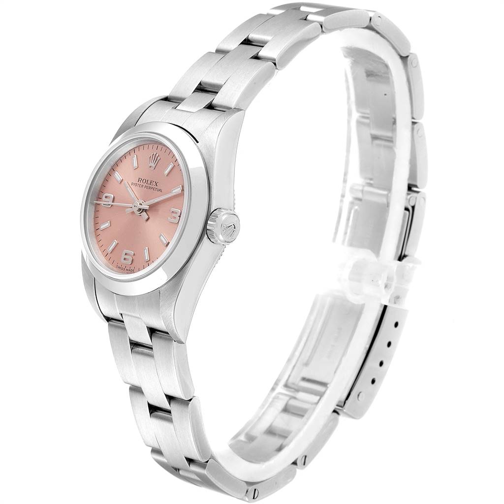 The image shows a side angle of the Rolex Oyster Perpetual 67180 Women's Stainless Steel Pink Dial 67180 Women's Stainless Steel Pink Dial watch highlighting the stainless steel bracelet and pink dial.