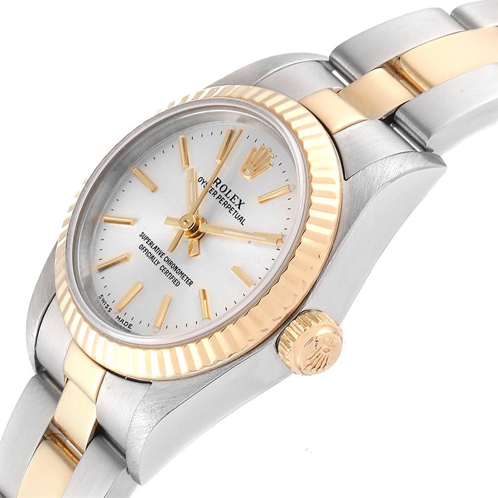 The image shows a close-up side angle of a Rolex Oyster Perpetual 76193 Women's Steel and Gold (two tone) Silver Dial 76193 Women's Steel and Gold (two tone) Silver Dial watch, highlighting the face, bezel, crown, and part of the bracelet.