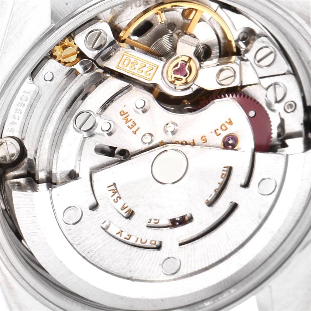 This image shows the movement mechanism of the Rolex Oyster Perpetual 76193 Women's Steel and Gold (two tone) Silver Dial 76193 Women's Steel and Gold (two tone) Silver Dial watch from a close-up, top-down angle.