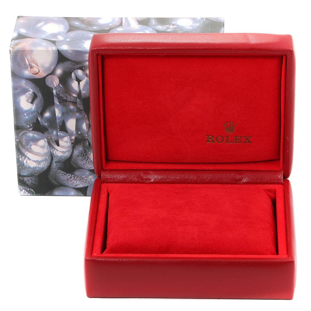 This image shows an empty red Rolex watch box for the Oyster Perpetual model, viewed from the front.