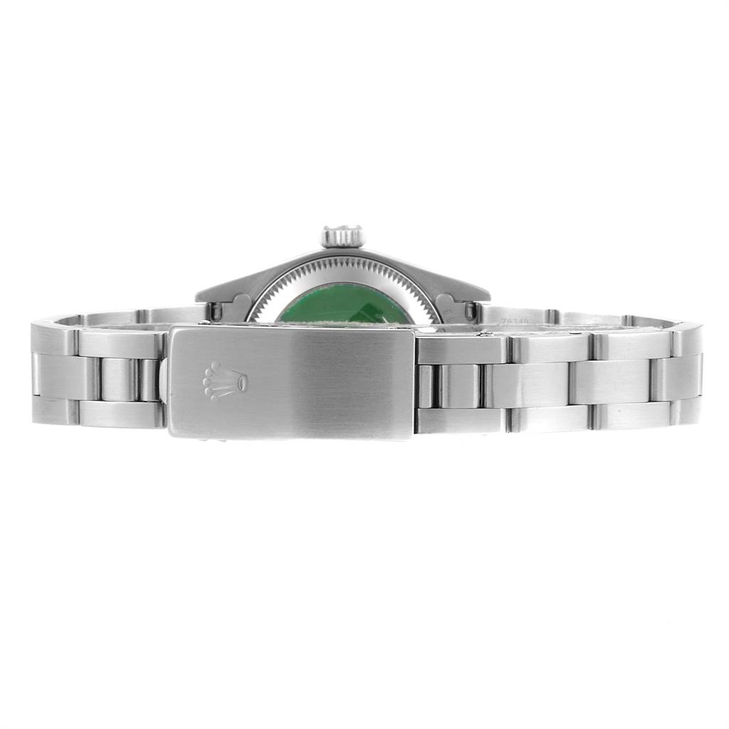 The image shows the back view of a Rolex Oyster Perpetual 67230 Women's Stainless Steel Pink Dial 67230 Women's Stainless Steel Pink Dial watch, highlighting the clasp and stainless steel bracelet.