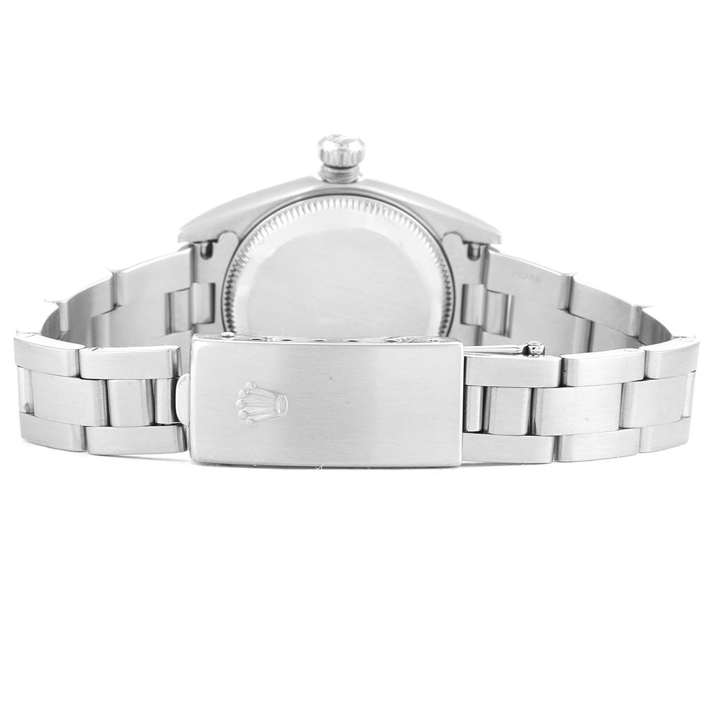 The image shows the back view of a Rolex Oyster Perpetual 76080 Women's Stainless Steel Black Dial 76080 Women's Stainless Steel Black Dial watch, highlighting its clasp, bracelet, and caseback.