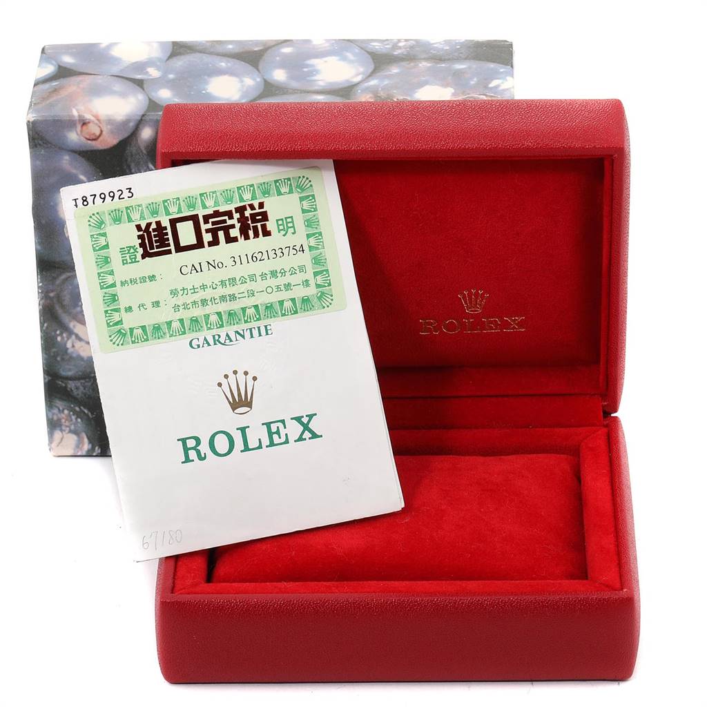 This image shows a red Rolex watch box open with a Rolex Oyster Perpetual 67180 Women's Stainless Steel Silver Dial 67180 Women's Stainless Steel Silver Dial warranty card.