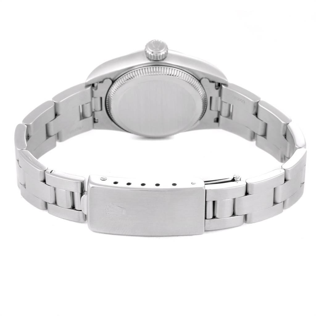 The image shows the backside of a Rolex Oyster Perpetual 67180 Women's Stainless Steel Silver Dial 67180 Women's Stainless Steel Silver Dial watch, highlighting its clasp and bracelet.