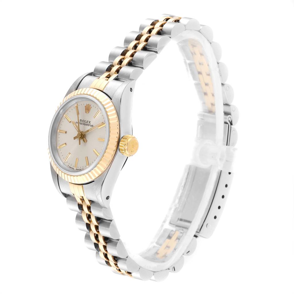 The image shows a side view of a Rolex Oyster Perpetual 67193 Women's Steel and Gold (two tone) Silver Dial 67193 Women's Steel and Gold (two tone) Silver Dial watch, featuring the dial, bezel, crown, and bracelet.