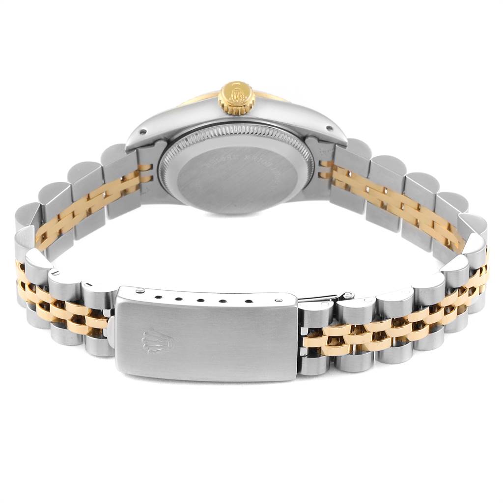 The image shows the back view of the band, clasp, and case of a Rolex Oyster Perpetual 67193 Women's Steel and Gold (two tone) Silver Dial 67193 Women's Steel and Gold (two tone) Silver Dial watch.