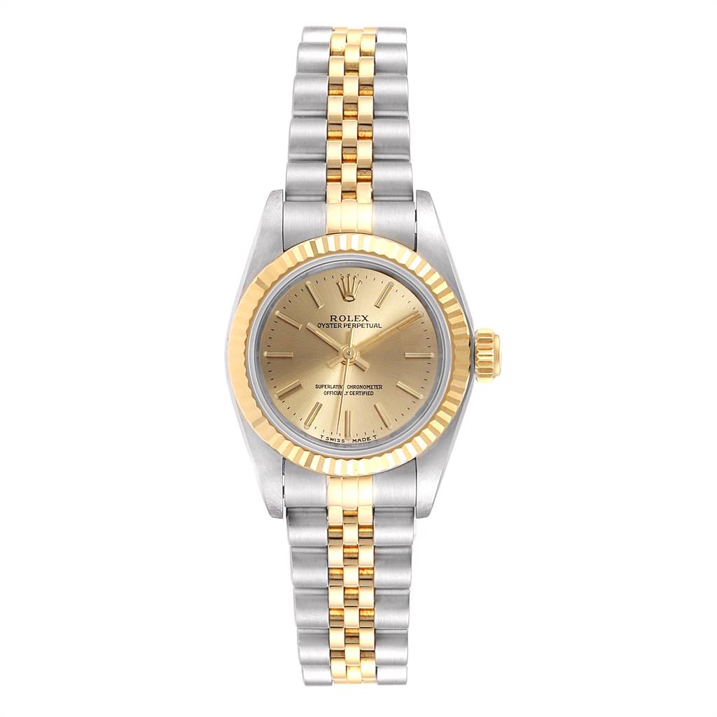 This Rolex Oyster Perpetual 67193 Women
s Steel and Gold (two tone) Champagne Dial 67193 Women
s Steel and Gold (two tone) Champagne Dial watch is viewed from the front, showcasing its dial, bezel, case, and bracelet.
