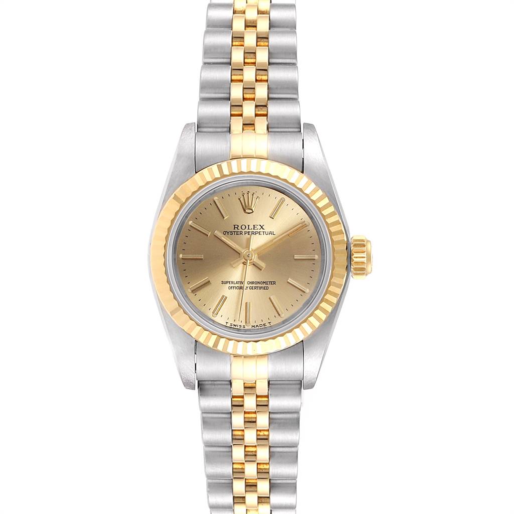 The image shows a Rolex Oyster Perpetual 67193 Women
s Steel and Gold (two tone) Champagne Dial 67193 Women
s Steel and Gold (two tone) Champagne Dial watch from a top-down angle, highlighting the dial, bezel, case, and bracelet.