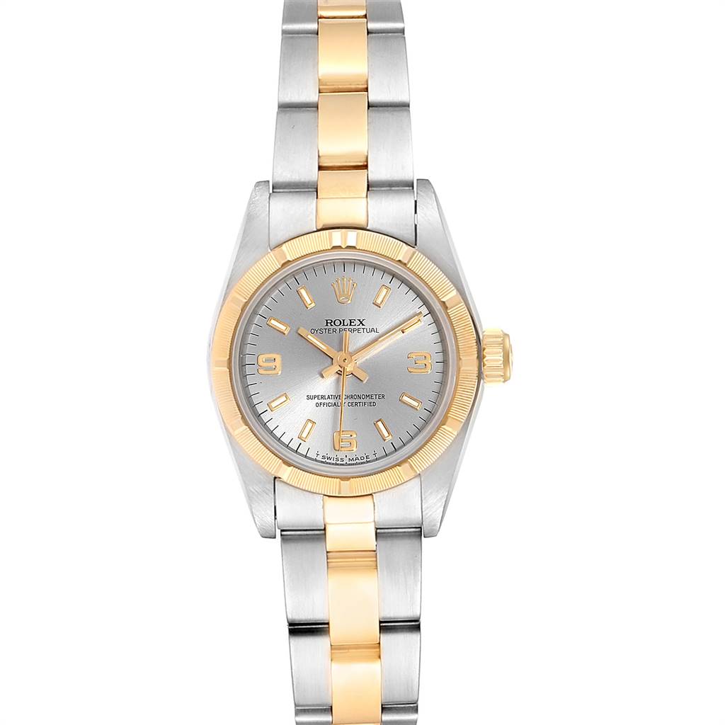 This image shows a front view of a Rolex Oyster Perpetual 67233 Women's Steel and Gold (two tone) Grey Dial 67233 Women's Steel and Gold (two tone) Grey Dial watch with a silver and gold two-tone bracelet and dial.