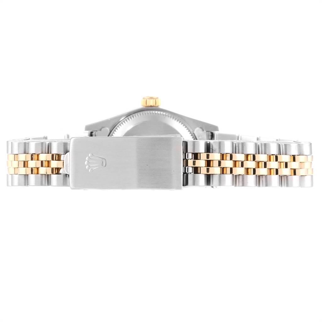 This image shows the back view of a Rolex Oyster Perpetual 76243 Women
s Steel and Gold (two tone) Black Dial 76243 Women
s Steel and Gold (two tone) Black Dial watch, focusing on the bracelet and clasp.