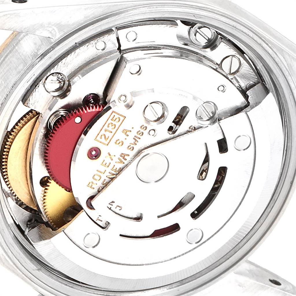 The image shows the internal movement mechanism of a Rolex Oyster Perpetual 67193 Women
s Steel and Gold (two tone) Champagne Dial 67193 Women
s Steel and Gold (two tone) Champagne Dial watch, viewed from the back.