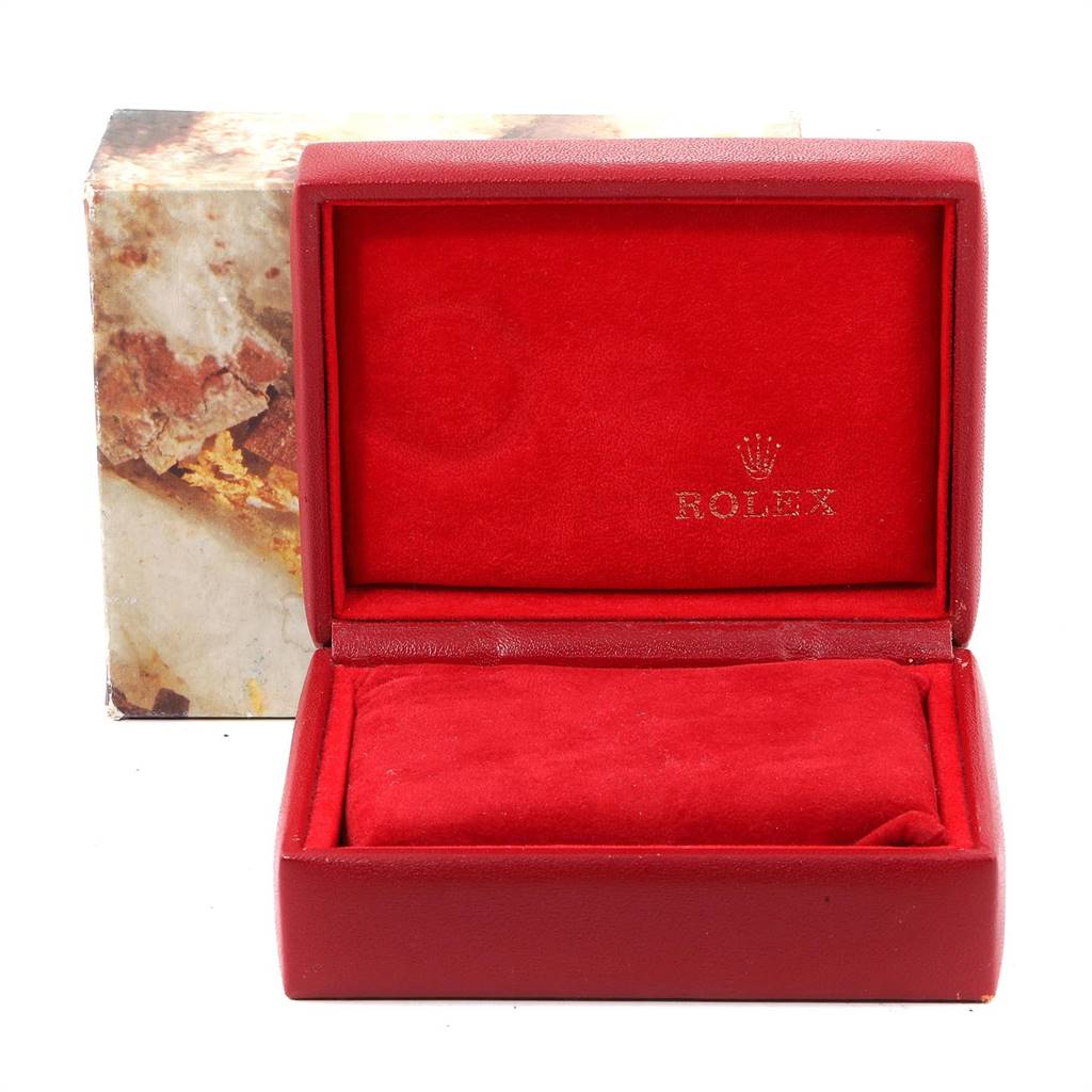 This image shows an empty red Rolex watch box, displayed open from a front angle without the Oyster Perpetual model watch inside.
