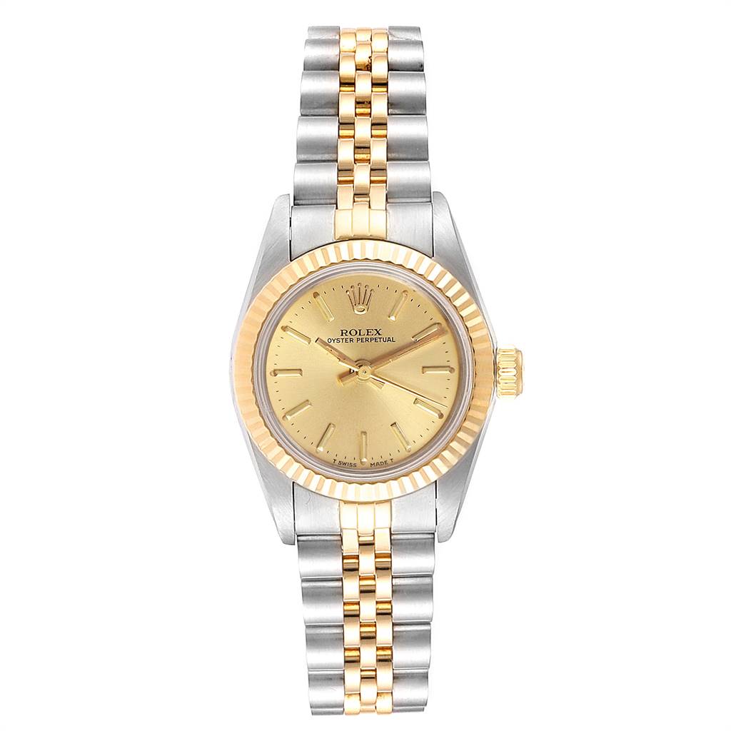 The image shows a front view of a Rolex Oyster Perpetual 67193 Women
s Steel and Gold (two tone) Champagne Dial 67193 Women
s Steel and Gold (two tone) Champagne Dial watch with a gold dial, bezel, and a two-tone metal bracelet.
