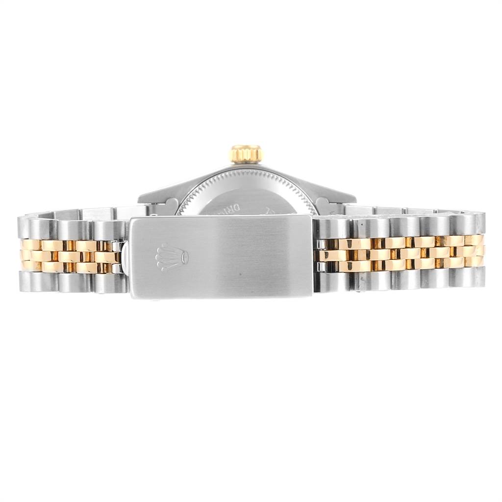 The image shows the back view of a Rolex Oyster Perpetual 67193 Women
s Steel and Gold (two tone) Champagne Dial 67193 Women
s Steel and Gold (two tone) Champagne Dial watch, highlighting the clasp, case back, and bracelet.