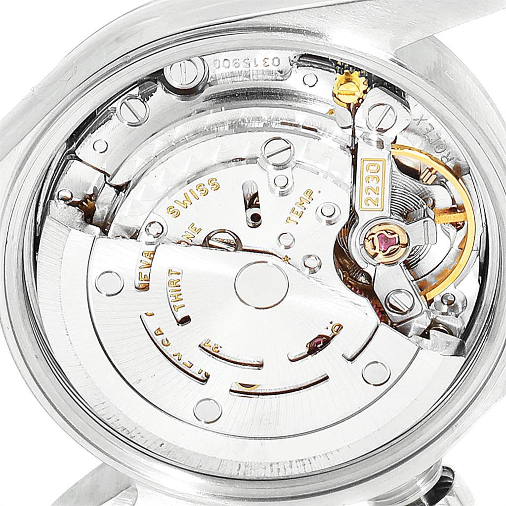 This is a close-up view of the movement mechanism inside the Rolex Oyster Perpetual 76080 Women's Stainless Steel Silver Dial 76080 Women's Stainless Steel Silver Dial watch.