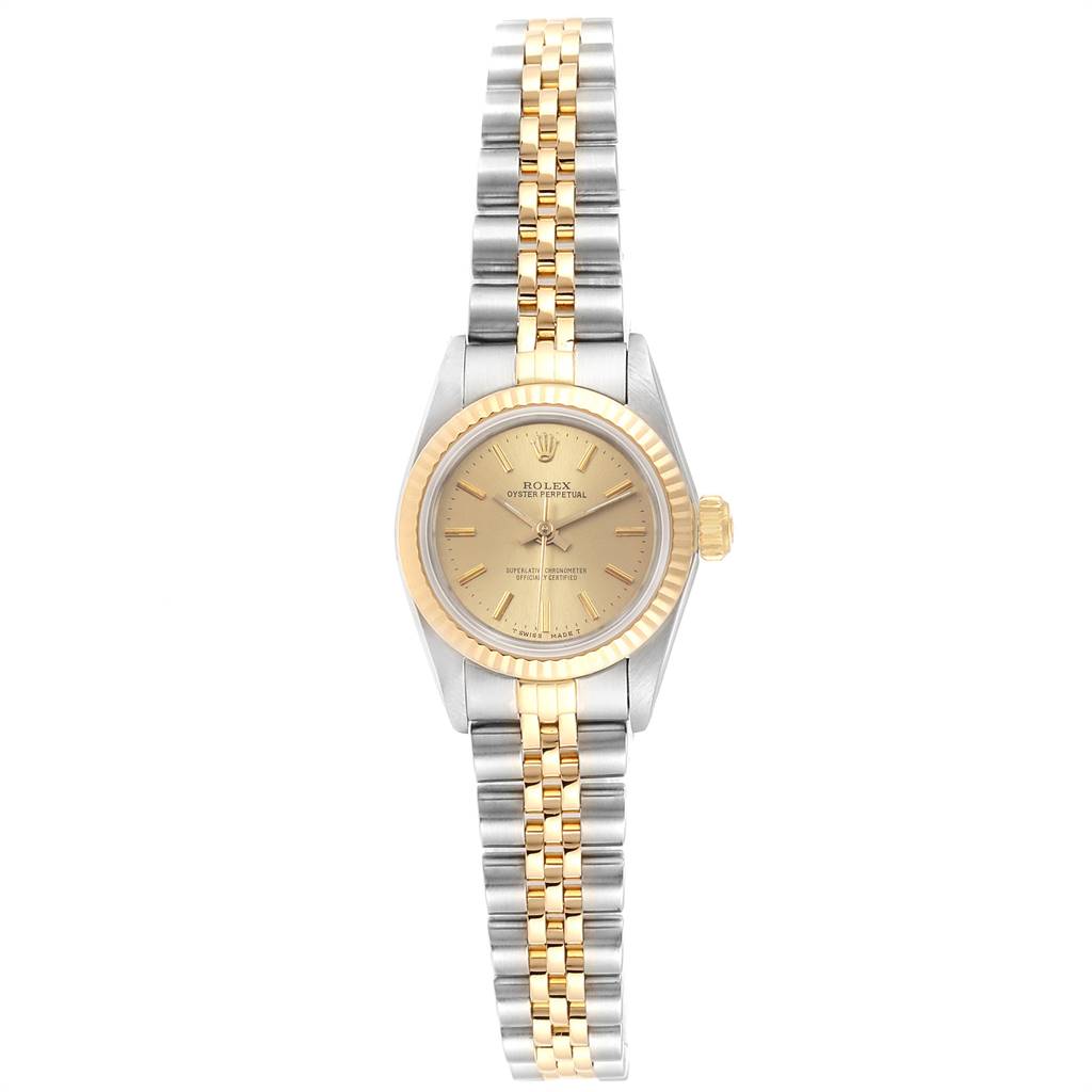 The image shows a Rolex Oyster Perpetual 67193 Women
s Steel and Gold (two tone) Champagne Dial 67193 Women
s Steel and Gold (two tone) Champagne Dial model watch from a front angle, highlighting its dial, bezel, and bracelet.