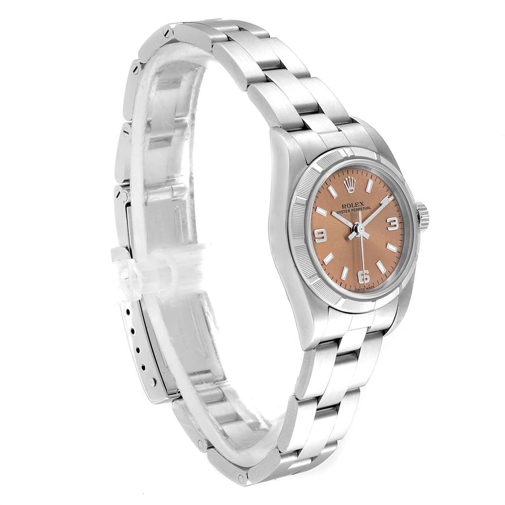 This is a side angle view of a Rolex Oyster Perpetual 76030 Women
s Stainless Steel Pink Dial 76030 Women
s Stainless Steel Pink Dial watch, showing the bracelet and face.