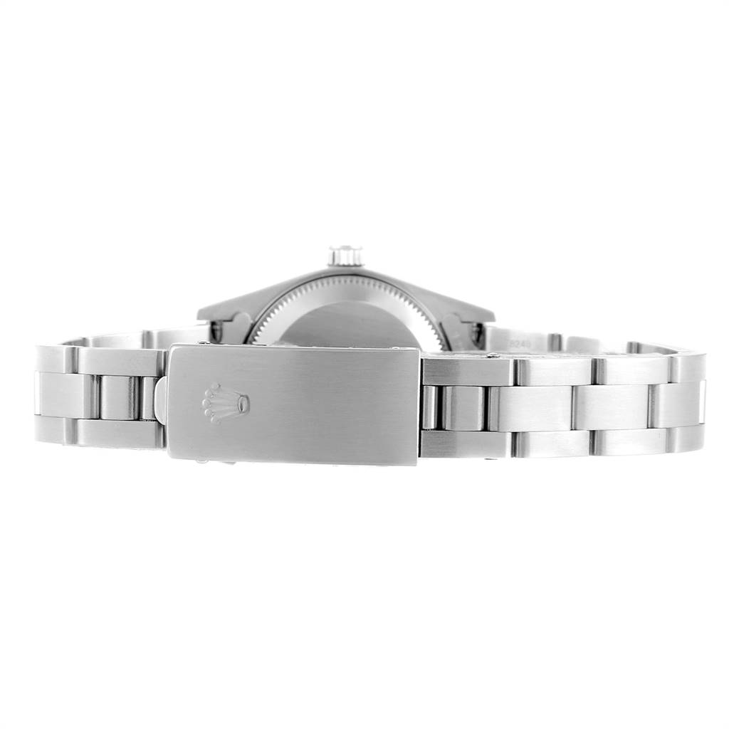 The image shows the back view of the Rolex Oyster Perpetual 76030 Women
s Stainless Steel Pink Dial 76030 Women
s Stainless Steel Pink Dial watch, focusing on the clasp and bracelet.