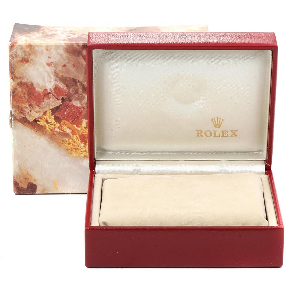 The image shows an open Rolex Oyster Perpetual 67194 Women's Stainless Steel Silver Dial 67194 Women's Stainless Steel Silver Dial watch box with a cushion inside.