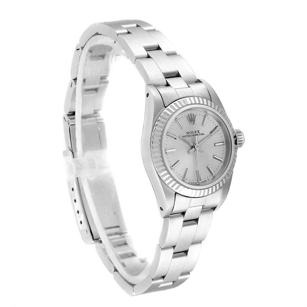The Rolex Oyster Perpetual 67194 Women's Stainless Steel Silver Dial 67194 Women's Stainless Steel Silver Dial watch is shown at a slight angle, highlighting the face, bezel, and part of the bracelet.