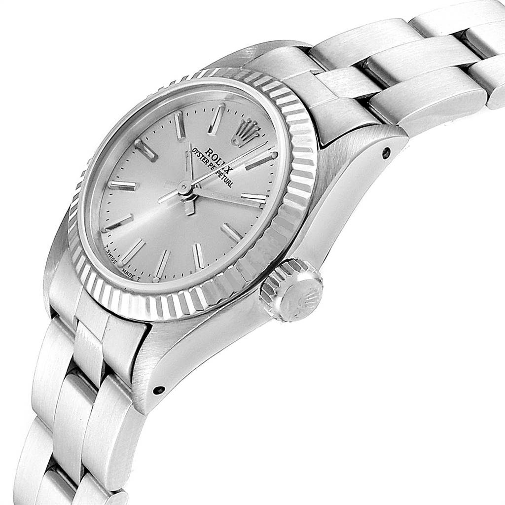 The image shows a side angle of a Rolex Oyster Perpetual 67194 Women's Stainless Steel Silver Dial 67194 Women's Stainless Steel Silver Dial watch, highlighting the crown, bezel, and part of the bracelet.