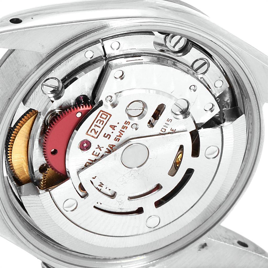 The image shows the internal movement mechanism of a Rolex Oyster Perpetual 67194 Women
s Stainless Steel White Dial 67194 Women
s Stainless Steel White Dial watch from a close-up, top-down angle.