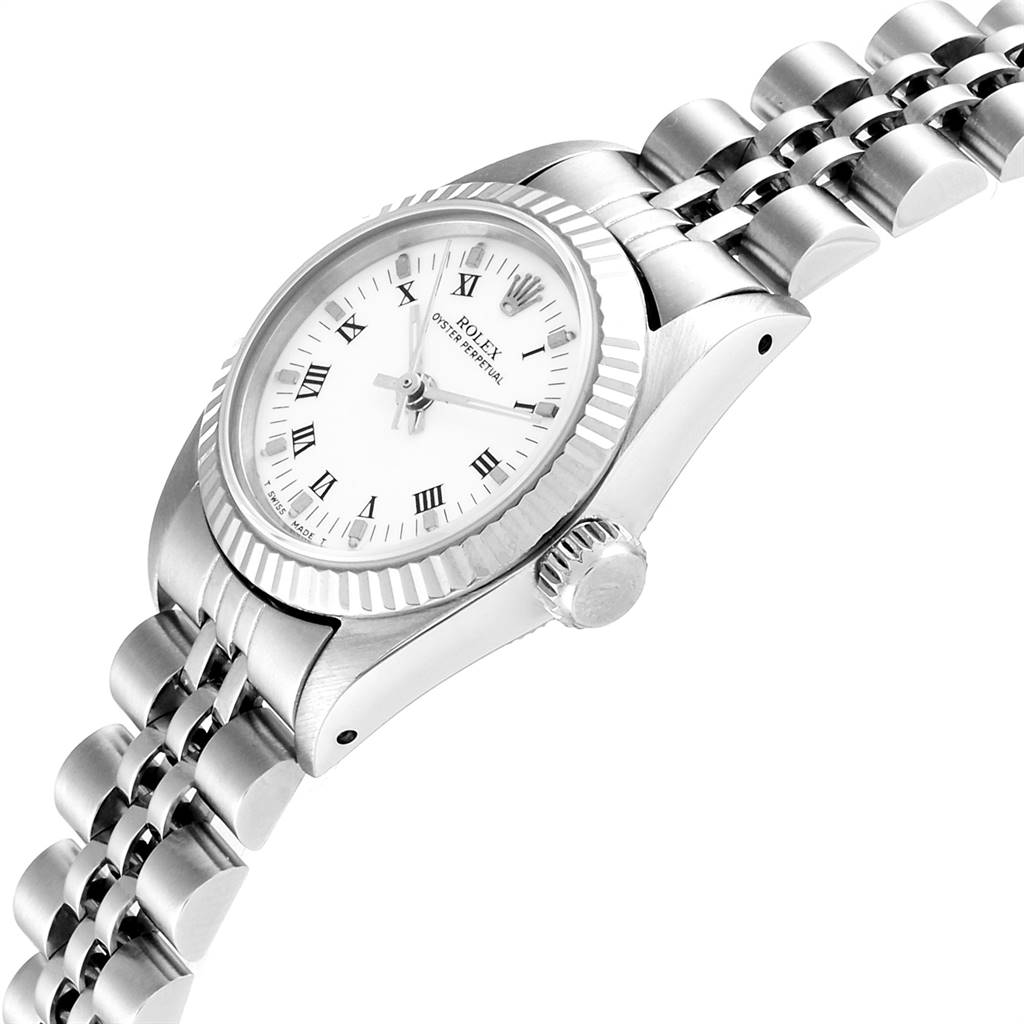 The image shows a close-up angled view of the Rolex Oyster Perpetual 67194 Women
s Stainless Steel White Dial 67194 Women
s Stainless Steel White Dial watch, highlighting the dial, bezel, crown, and part of the bracelet.