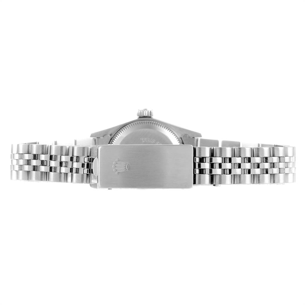 This image shows the back of the Rolex Oyster Perpetual 67194 Women
s Stainless Steel White Dial 67194 Women
s Stainless Steel White Dial watch, highlighting the bracelet and clasp with the Rolex logo.