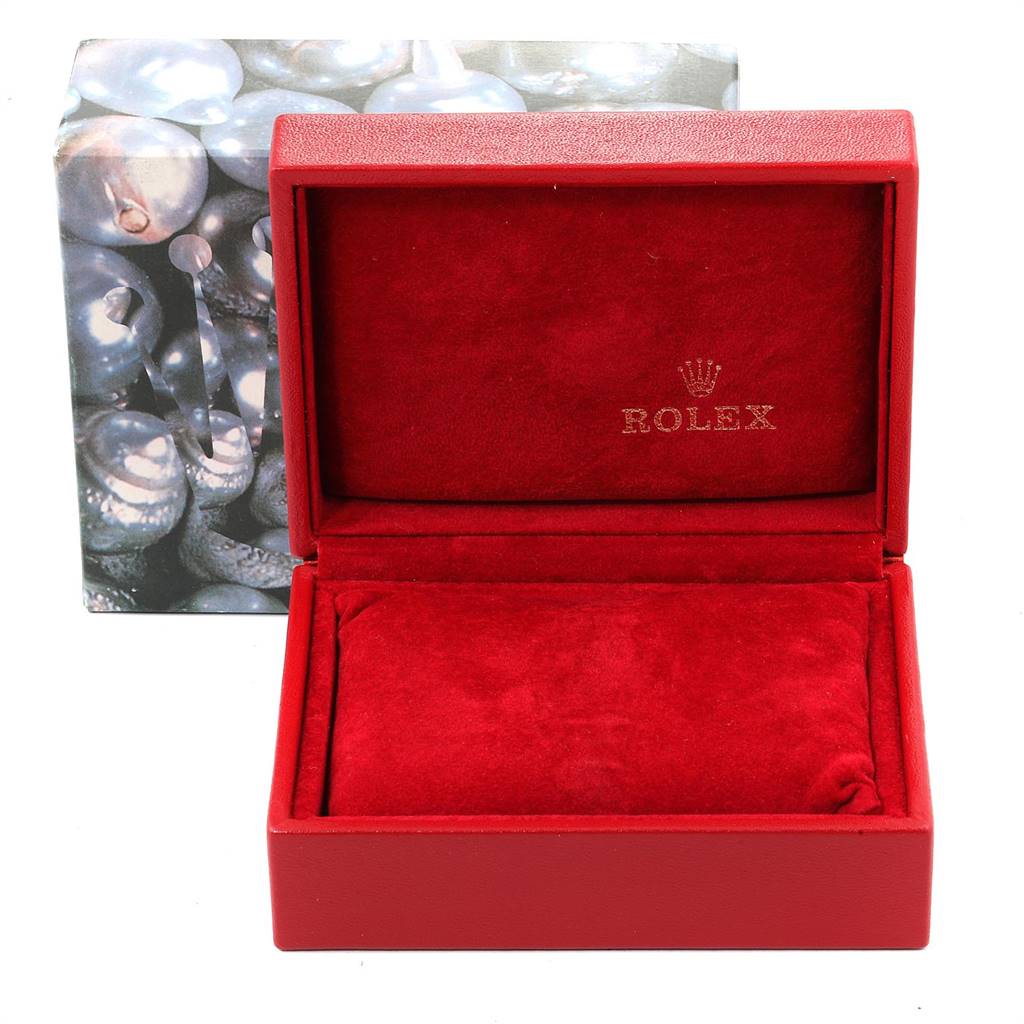 This image shows an opened Rolex Oyster Perpetual 67183 Women
s Steel and Gold (two tone) Champagne Dial 67183 Women
s Steel and Gold (two tone) Champagne Dial red watch box with a velvet interior, without a watch inside.