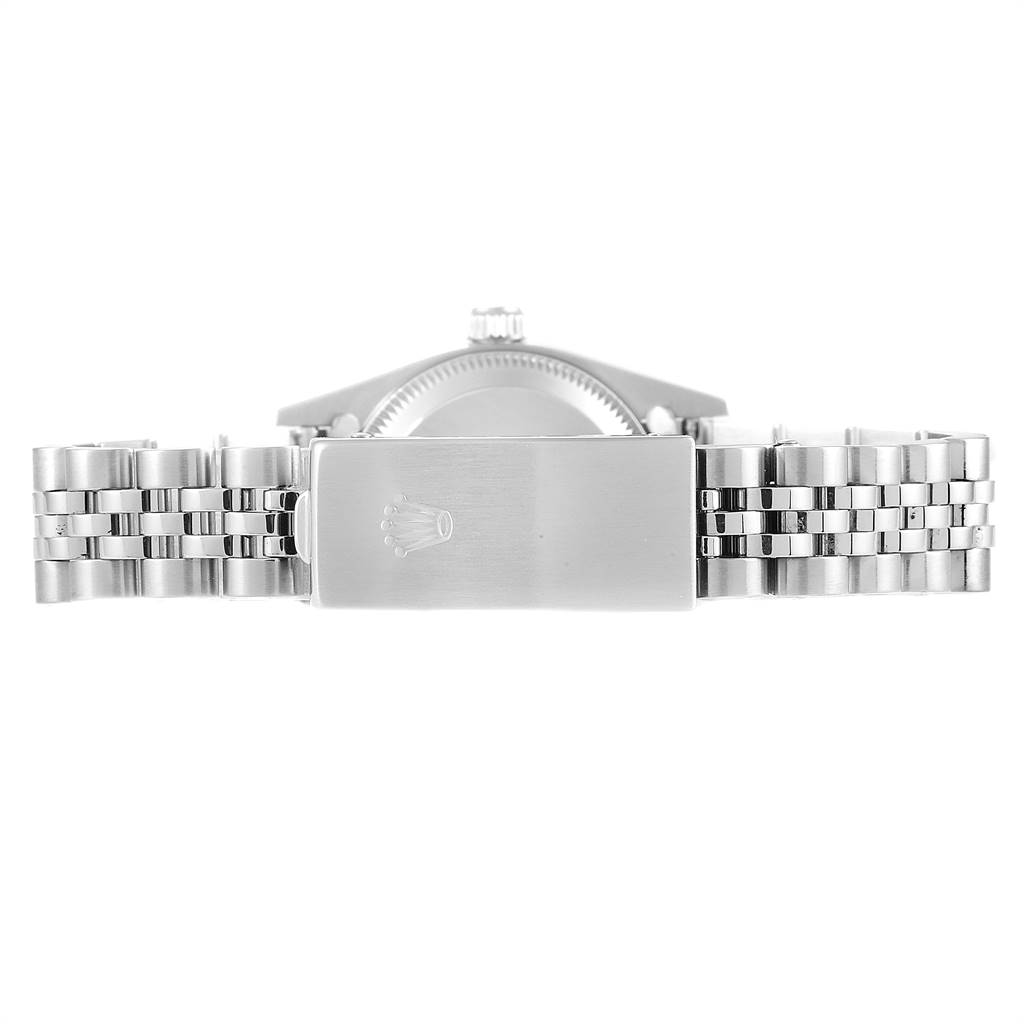 The image shows the clasp and bracelet of a Rolex Oyster Perpetual 76094 Women's Stainless Steel Silver Dial 76094 Women's Stainless Steel Silver Dial watch from the back angle.
