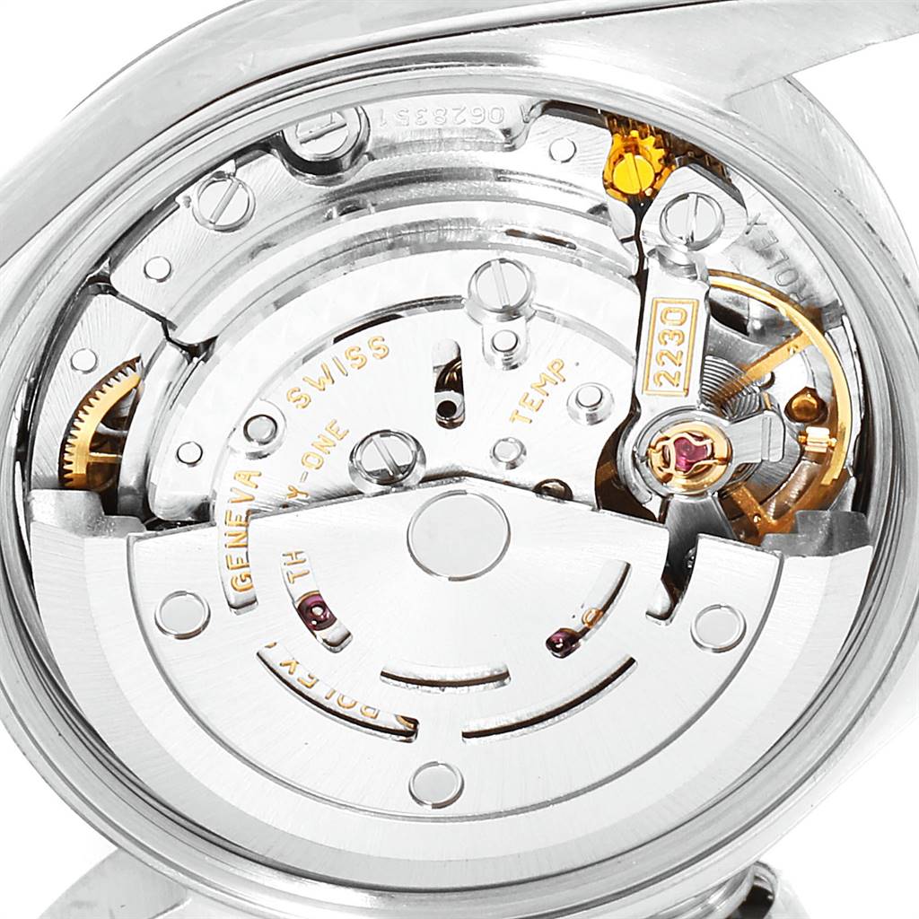 The image shows the internal movement mechanism of a Rolex Oyster Perpetual 76080 Women
s Stainless Steel White Dial 76080 Women
s Stainless Steel White Dial watch viewed from the back.
