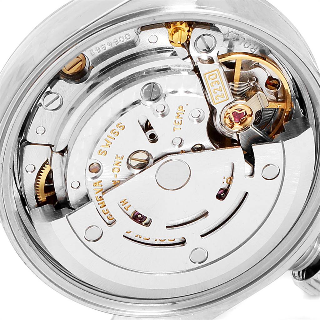 The image shows a close-up view of the internal mechanism of a Rolex Oyster Perpetual 76080 Women's Stainless Steel Blue Dial 76080 Women's Stainless Steel Blue Dial watch.