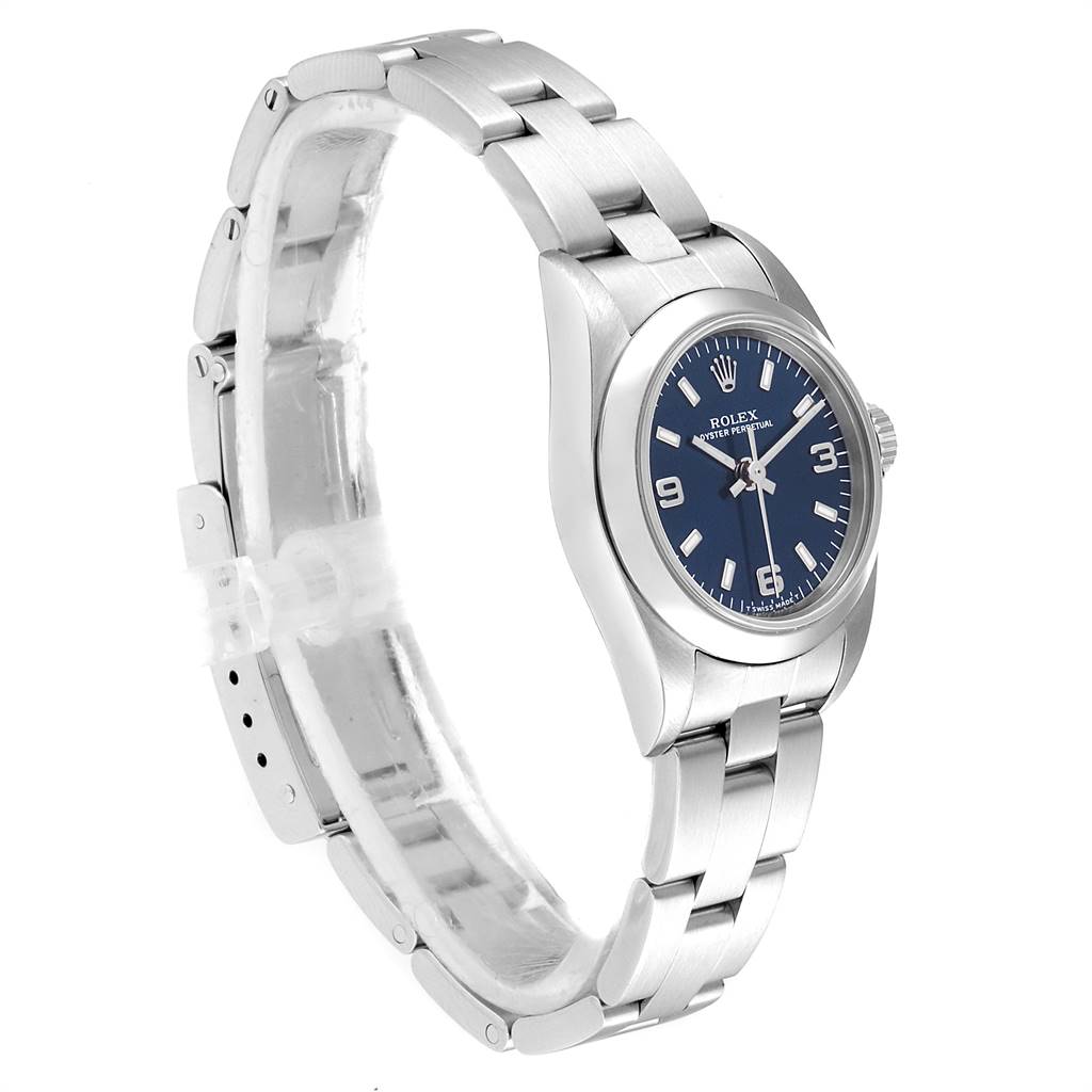 The image shows a side-angle view of the Rolex Oyster Perpetual 76080 Women's Stainless Steel Blue Dial 76080 Women's Stainless Steel Blue Dial watch, highlighting its bracelet and blue dial.
