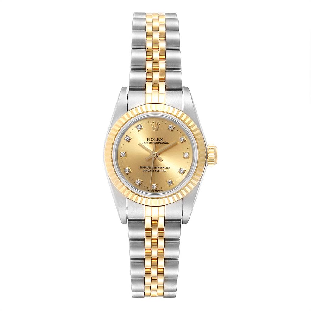 This image shows a frontal view of a Rolex Oyster Perpetual 76193 Women
s Steel and Gold (two tone) Champagne Dial 76193 Women
s Steel and Gold (two tone) Champagne Dial watch, highlighting the dial, bezel, and two-tone bracelet.