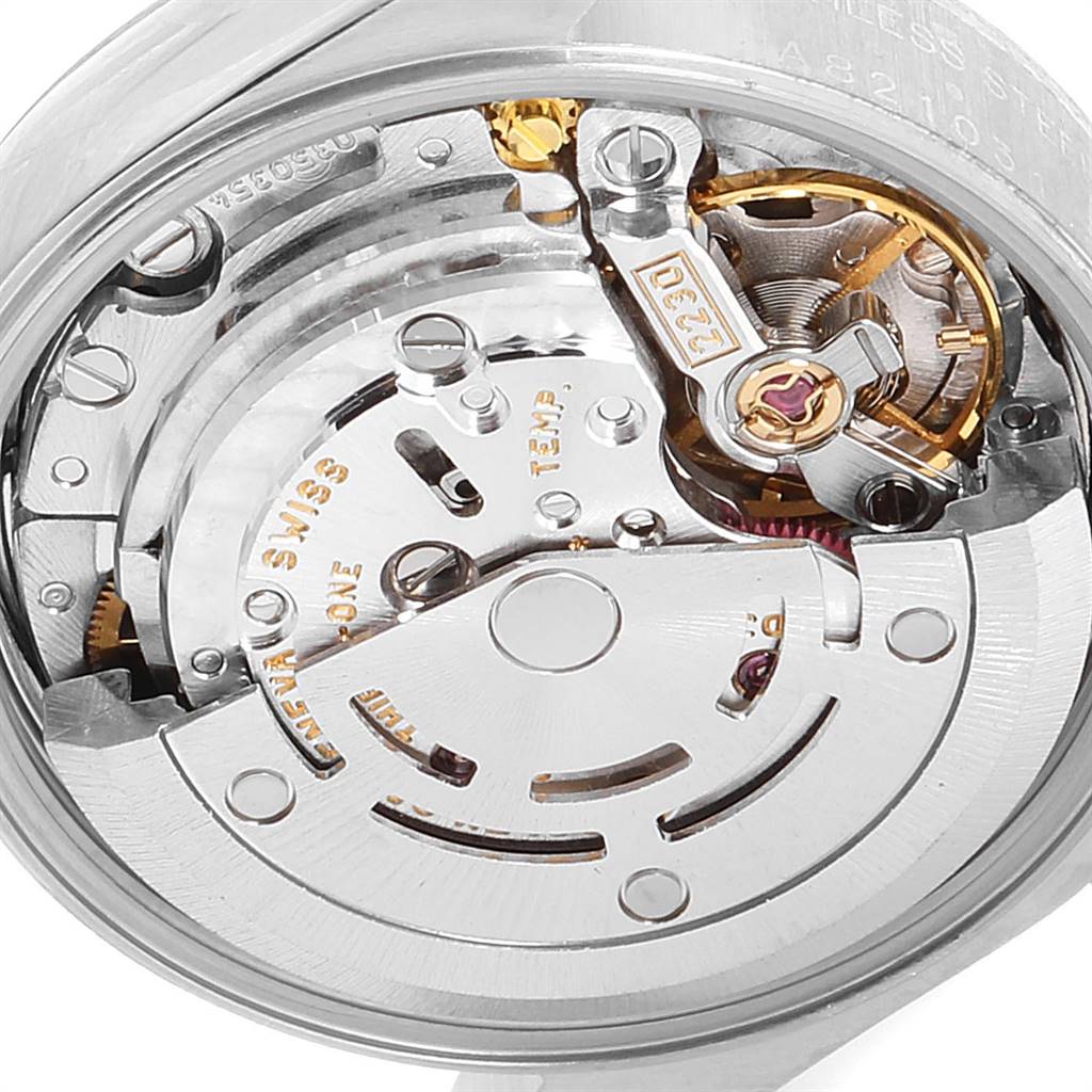 This image shows the detailed inner mechanism and movement of the Rolex Oyster Perpetual 76030 Women's Stainless Steel Pink Dial 76030 Women's Stainless Steel Pink Dial watch from a close-up, back-angle view.