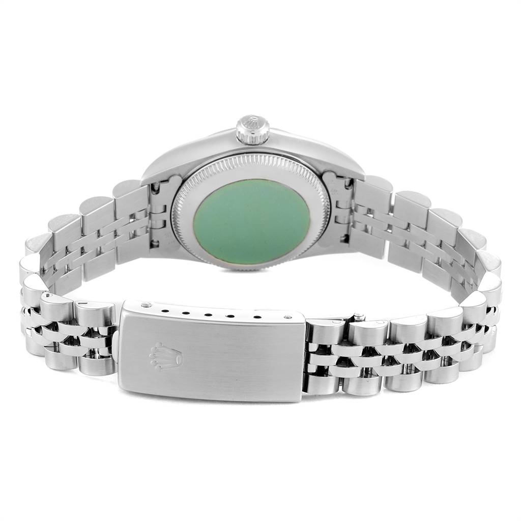 The image shows the back view of a Rolex Oyster Perpetual 76030 Women's Stainless Steel Pink Dial 76030 Women's Stainless Steel Pink Dial watch, focusing on the case back, crown, and bracelet with the clasp.