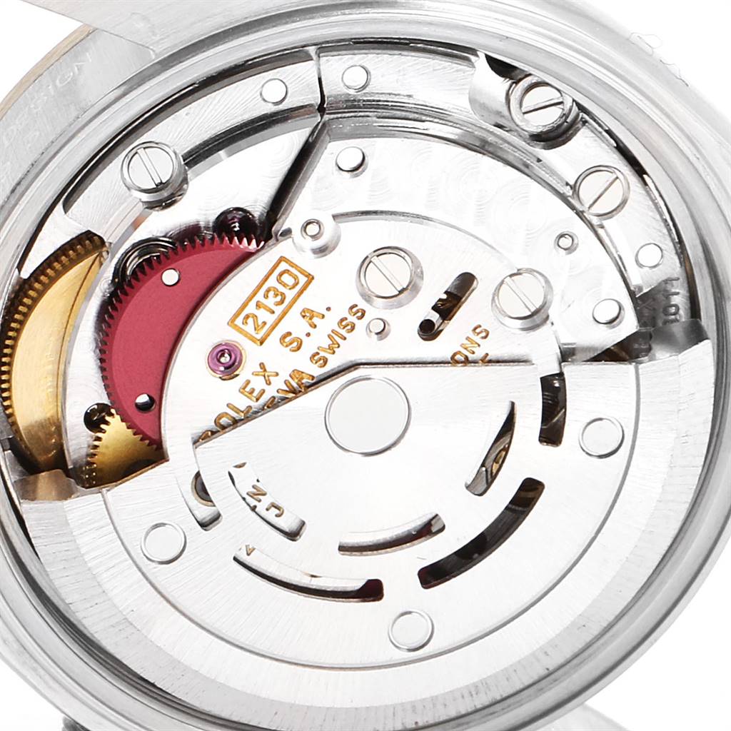 This image shows a close-up of the movement mechanism inside the Rolex Oyster Perpetual 67193 Women's Steel and Gold (two tone) Grey Dial 67193 Women's Steel and Gold (two tone) Grey Dial watch.