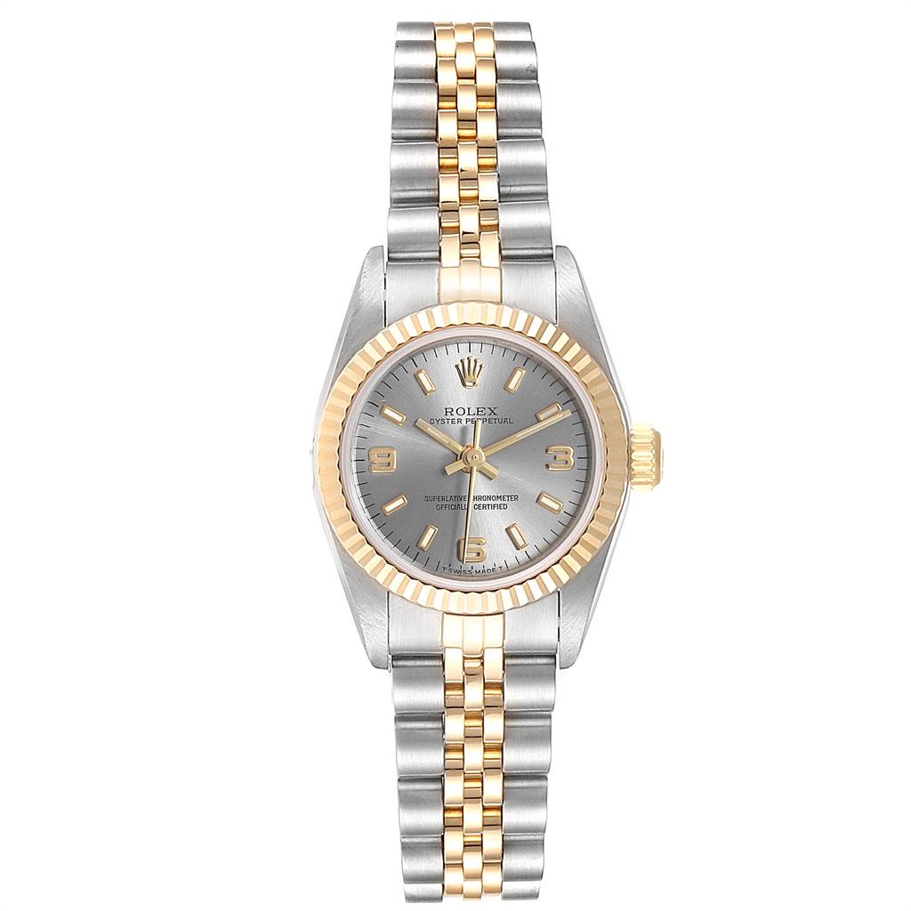 The image shows a frontal view of a Rolex Oyster Perpetual 67193 Women's Steel and Gold (two tone) Grey Dial 67193 Women's Steel and Gold (two tone) Grey Dial watch, highlighting its two-tone bracelet, gold bezel, and silver dial.