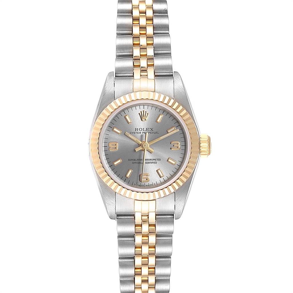The image shows a front view of a Rolex Oyster Perpetual 67193 Women's Steel and Gold (two tone) Grey Dial 67193 Women's Steel and Gold (two tone) Grey Dial watch, highlighting its two-tone bracelet and silver dial.