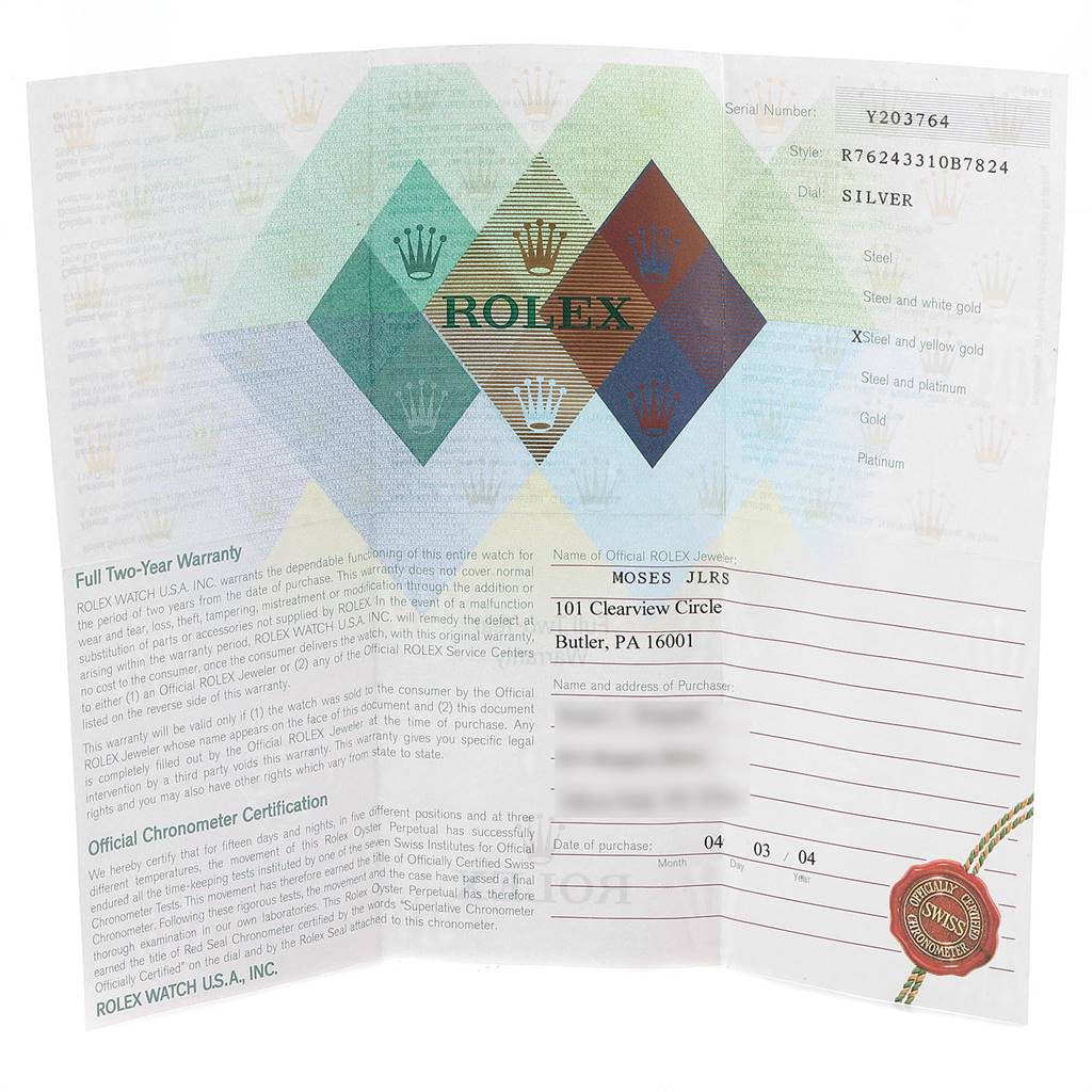 This image shows the guarantee card and warranty certification for a Rolex Oyster Perpetual 76243 Women's Steel and Gold (two tone) Silver Dial 76243 Women's Steel and Gold (two tone) Silver Dial watch.