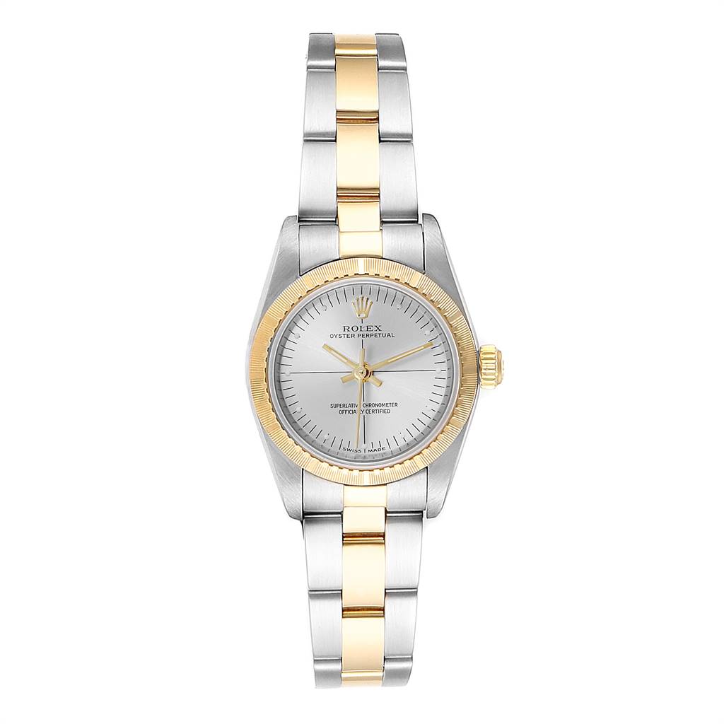 This image shows a front view of the Rolex Oyster Perpetual 76243 Women's Steel and Gold (two tone) Silver Dial 76243 Women's Steel and Gold (two tone) Silver Dial watch featuring a two-tone bracelet and a silver dial with gold accents.