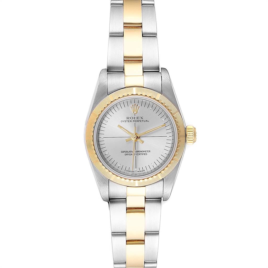 This image shows a front view of a Rolex Oyster Perpetual 76243 Women's Steel and Gold (two tone) Silver Dial 76243 Women's Steel and Gold (two tone) Silver Dial watch, highlighting its gold and silver bracelet and dial.