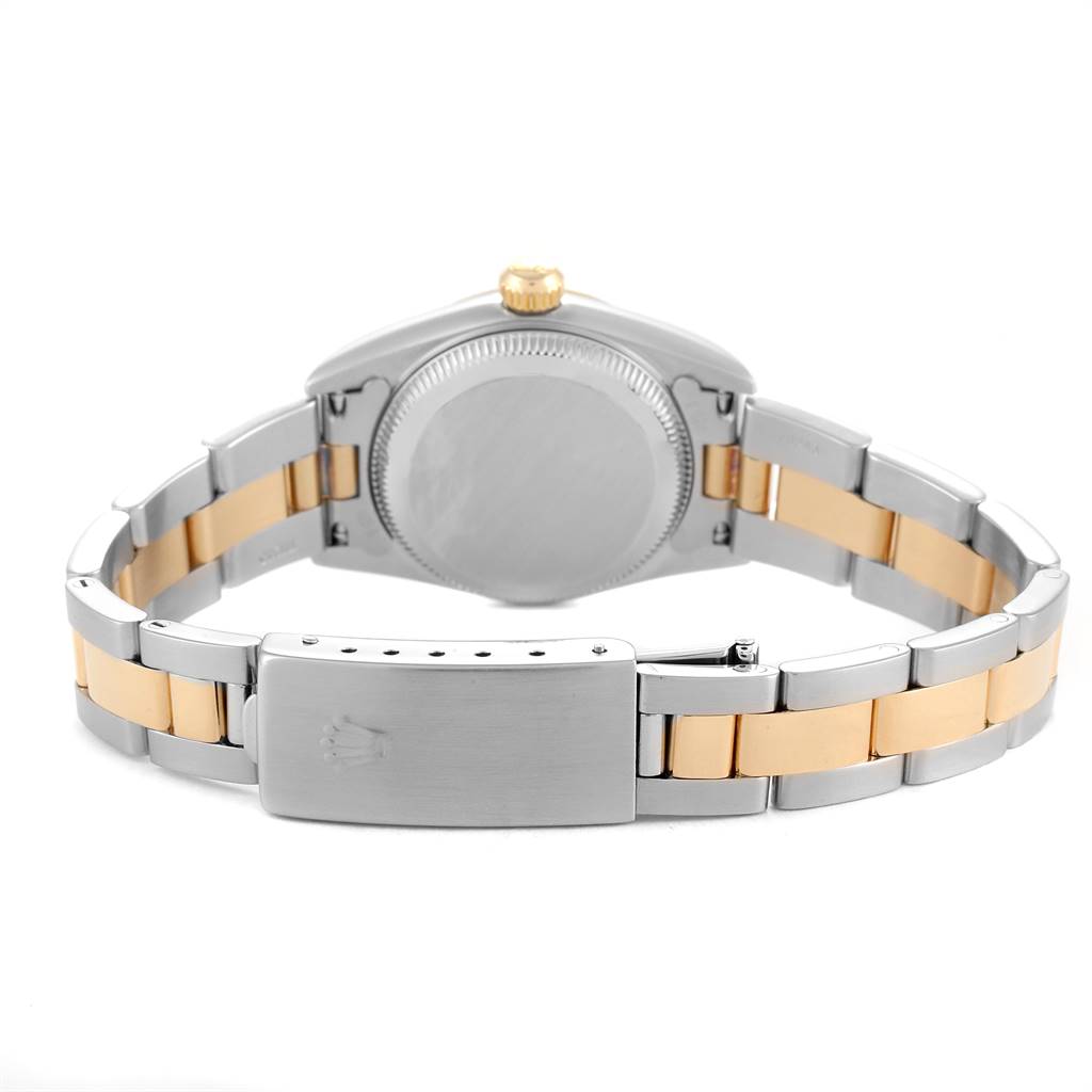 This image shows the back of a Rolex Oyster Perpetual 76243 Women's Steel and Gold (two tone) Silver Dial 76243 Women's Steel and Gold (two tone) Silver Dial watch and its bracelet, highlighting the clasp and caseback.