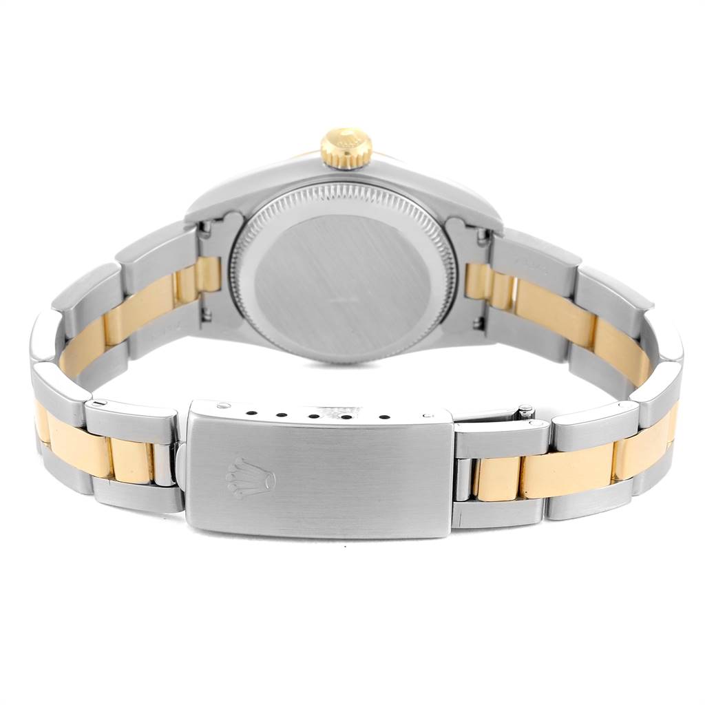 The image shows the back view of the Rolex Oyster Perpetual 67193 Women's Stainless Steel Champagne Dial 67193 Women's Stainless Steel Champagne Dial watch, highlighting the case back, bracelet, and clasp.