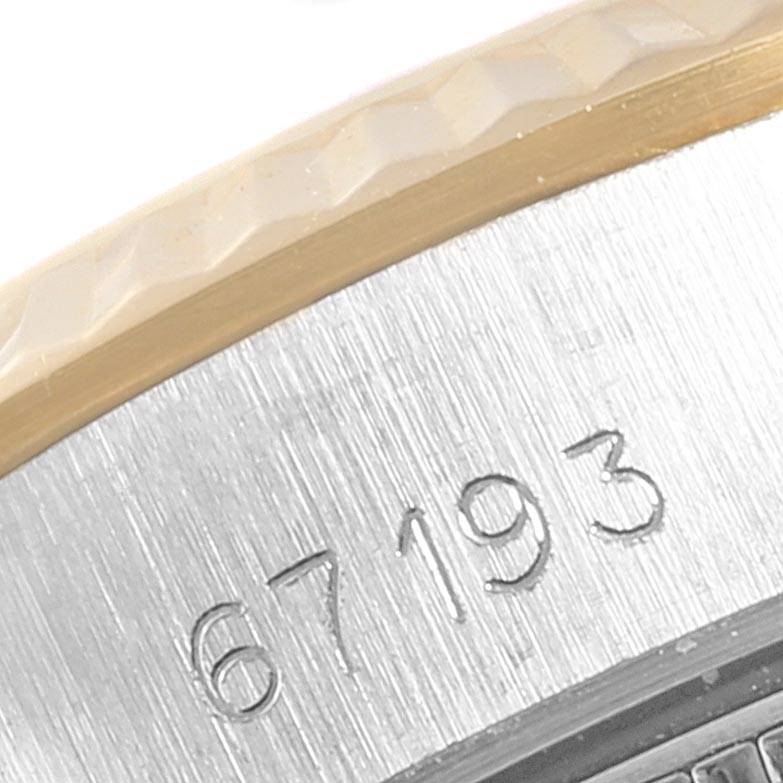 This image shows a close-up of the engraved model number "67193" on the case of a Rolex Oyster Perpetual 67193 Women
s Steel and Gold (two tone) Champagne Dial 67193 Women
s Steel and Gold (two tone) Champagne Dial watch.
